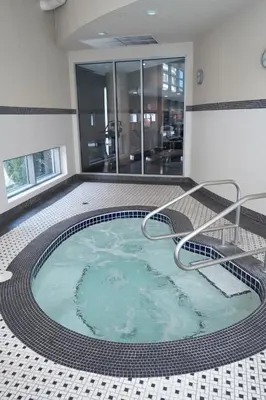 a hot tub in the middle of a building at Center of the City in Vancouver
