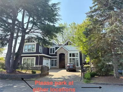 a house with a car parked in front of it at Kane Jolly Lodge in Richmond
