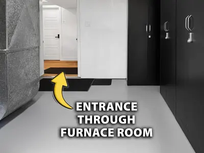 a hallway with an entrance through a furnace room at Private Studio - 5 Min to DT - Self Check-In - 75 Inch TV in Williams Lake