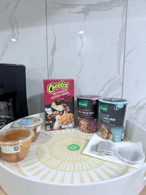 a table with some food on top of it at Spacious 2 bedroom 3 beds lower unit with separate entrance and parking space Near Downtown, Calgary Zoo, Costco and many more in Calgary