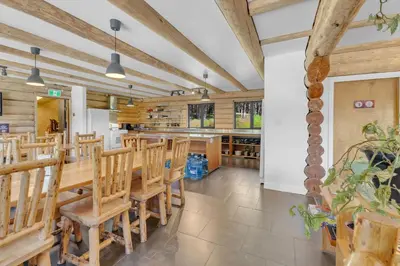 a dining room with a table and chairs at HI Nordegg - Hostel in Nordegg