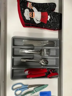 a drawer full of utensils in a refrigerator at Home in west Edmonton in Edmonton
