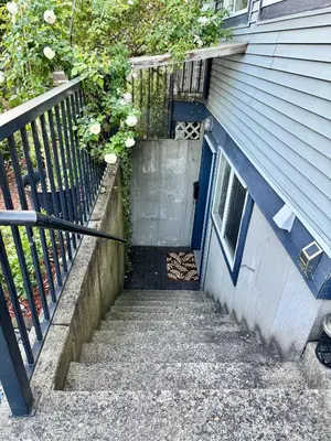 a set of stairs leading up to a house at Peaceful House with Backyard in Langley