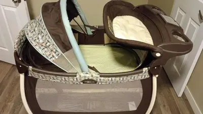 a baby carriage sitting in a room at Beautifully Finished Basement Suite, Shared Entrance, SW Edmonton in Edmonton