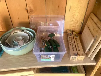 a drawer with a plastic container with tools on it at Tree Top Sanctuary Cowichan Valley in Duncan