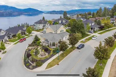 an aerial view of a residential street with houses at Relaxing Lakeview 2 bedroom entire suite in Kelowna