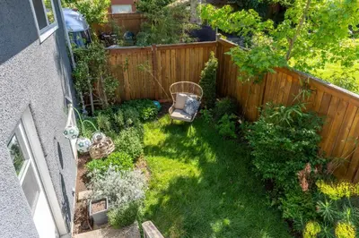 an overhead view of a garden with a fence at Mid-Century Modern Apartment at Horner Park in Victoria