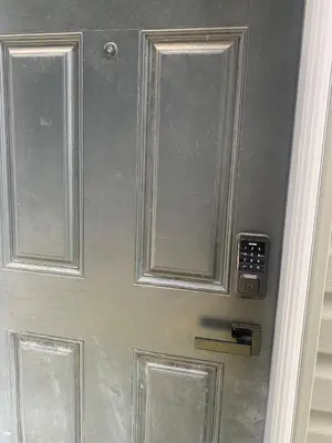 a door with a cabinet on top of it at Modern 1BR Entire Suite Near Airport in Calgary
