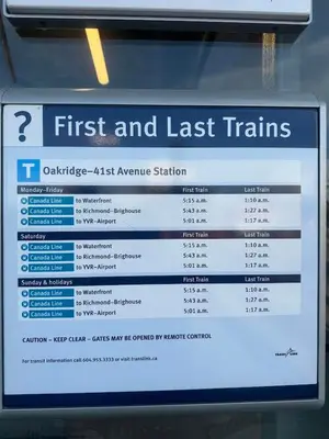 a sign that says first and last trains at Comfort cottage guest home near subway station, bus and downtown in Vancouver