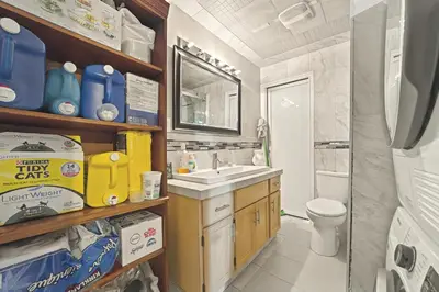 a bathroom with a sink and a toilet at Calgary - By Mountains and Ski in Calgary