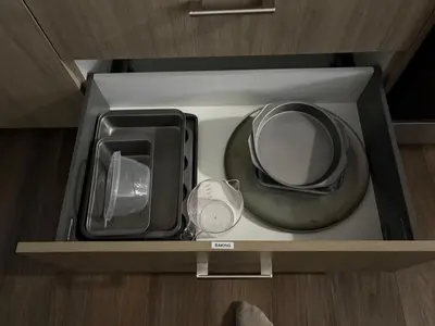 a drawer with a mirror and other items in it at Relax in Comfort, AC, YYC, CrossIron Mills, Banff in Calgary