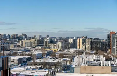 a view of a city with tall buildings at Peaceful City Stay, Calm Vibes in a Cozy in Vancouver