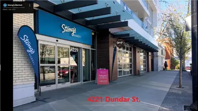 a street view of a dunkin donut shop at Dunbar Guest Home close downtown Vancouver, UBC and store in Vancouver