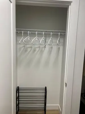 a closet with a rack of drying utensils at Oceanside 2 Bedroom Suite in Royal Bay-Free Nespresso Coffee with Welcome Treats in Colwood