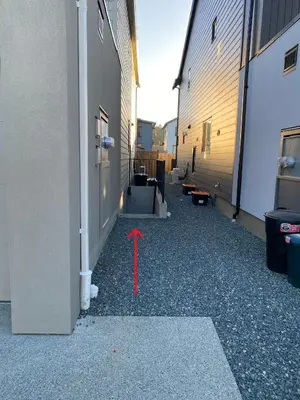 a red arrow pointing to the side of a building at Oceanside 2 Bedroom Suite in Royal Bay-Free Nespresso Coffee with Welcome Treats in Colwood