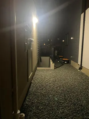 a dark room with a hallway with a light at Oceanside 2 Bedroom Suite in Royal Bay-Free Nespresso Coffee with Welcome Treats in Colwood