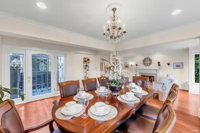 a dining room with a table and chairs at Luxuary Stay in West Vancouver in West Vancouver