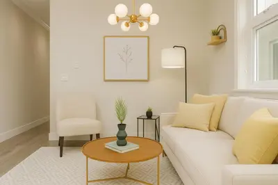 a living room with a white couch and a table at Spacious 4BD Home in Vancouver in Vancouver