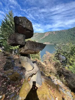a pile of rocks on the side of a mountain at Malahat Fairyland Cottage in Malahat