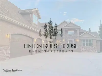 a custom guest house sign in front of a house at A Gorgeous Mansion for Jasper Vacation in Hinton