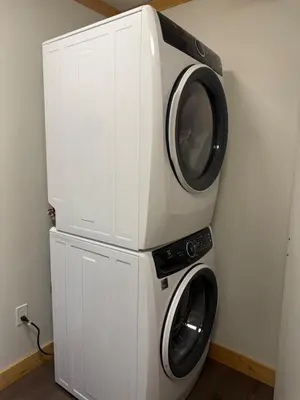 a washer and dryer stacked on top of each other at Our little heaven Entire house 5 min south of town in Golden