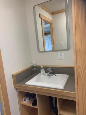 a bathroom with a sink and a mirror at Our little heaven Entire house 5 min south of town in Golden