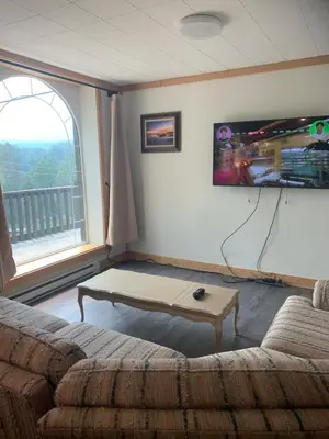a living room with a couch and a coffee table at Our little heaven Entire house 5 min south of town in Golden