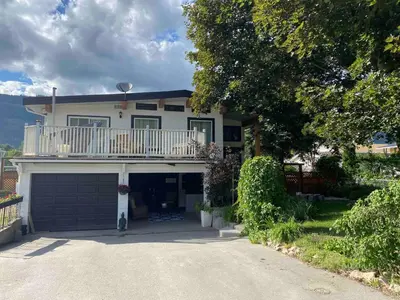 a large house with a balcony and a garage at Magical Themed Decor! Pets Welcome! 3 Bedrooms in Chase