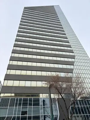 a tall building with a lot of windows at Boho Studio Downtown Rogers Views Heated Parking in Edmonton