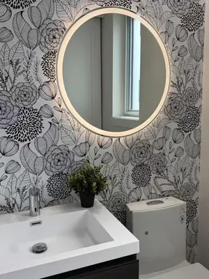 a bathroom with a sink and a mirror at Roger & May's Cabin in Vancouver