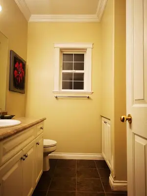 a bathroom with a toilet and a window at Eagle's House, Room #1 in Victoria