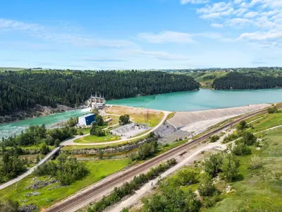an aerial view of a dam on a river at Cozy 2BR Suite with Kitchen, AC Near U of C, Winsport, Banff and Hospitals in Calgary