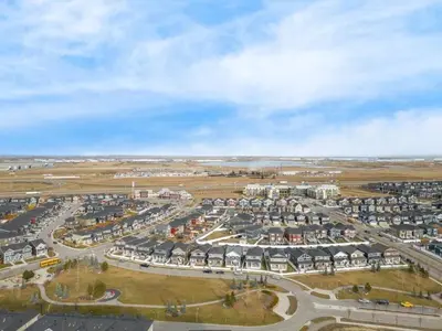 an aerial view of a parking lot with houses at Bright 2BR Suite Near YYC & Mall in Calgary