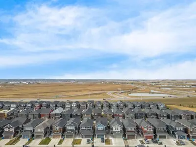 an aerial view of a row of houses at Bright 2BR Suite Near YYC & Mall in Calgary