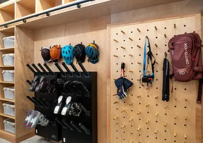 a rock climbing wall with equipment on it at Ghost Peak Chalet - Ski-In Access in Port Mann