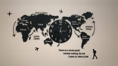 a clock on a wall with a map of the world at Carrie The Gentle Nest 1 in Coquitlam