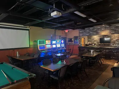 a dining room with tables and ping pong balls at Big Horn motor Inn in Grande Cache