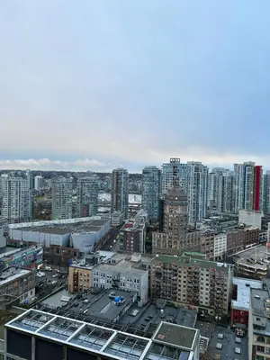 an aerial view of a city with tall buildings at Cozy Gastown condo with a view! in Vancouver