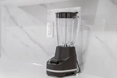 a blender sitting on top of a counter at Classic 2 Bed-Basement Near the lake in Edmonton