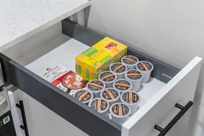a drawer with cupcakes and a box of cereal at Classic 2 Bed-Basement Near the lake in Edmonton
