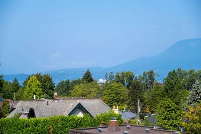 a view from the roof of a house at Elegant Spanish Villa with Ocean & Mountain Views in Vancouver