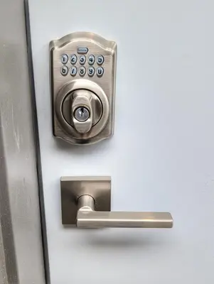 a metal door with a lock on a door at Oakview Hideaway in Victoria
