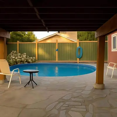 a swimming pool with chairs and a table in a patio at Melrose Place Poolside Hideaway Heated Pool All Year Ideal for Groups Sleeps 6 plus in Victoria