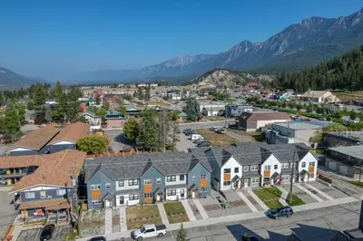 an aerial view of a small town with houses at Stunning NEW 3 Bedroom Mountain View Condo in Radium Hot Springs
