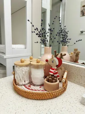 a basket with a reindeer and other items on a counter at Cozy Dreamscape in Surrey