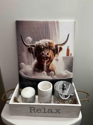 a box with a picture of a cow in a bath tub at Calgary&Downtown&BMO Centre & Parking in Calgary