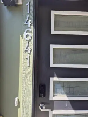 a sign on the side of a building at Superb 1-Bdr Apt in New Condo in Calgary