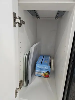 a box in the door of a refrigerator at Non Smoking- Stylish Basement Suite Near Airport, Trails & Dining in Edmonton