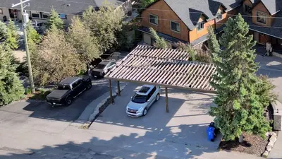 an overhead view of cars parked in a parking lot at Rocky View Bed & Breakfast in Calgary