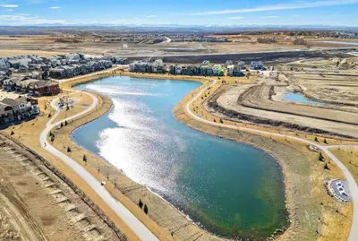 an aerial view of a river in a city at Cozy 3-Bedroom Family Retreat Home in Rangeview in Calgary